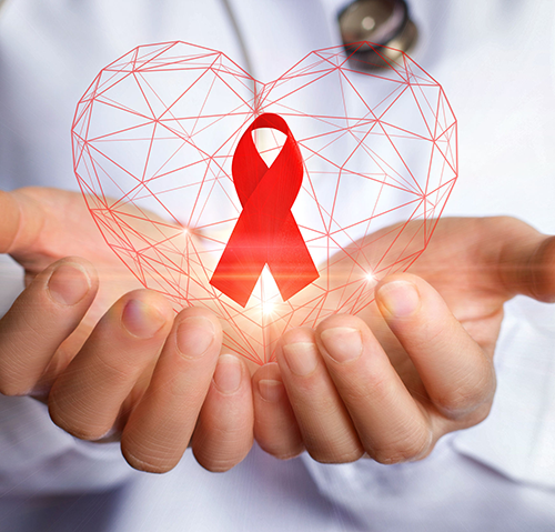 Hands holding heart with AIDS ribbon